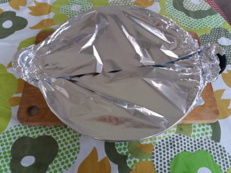 Paella tapada con papel aluminio
