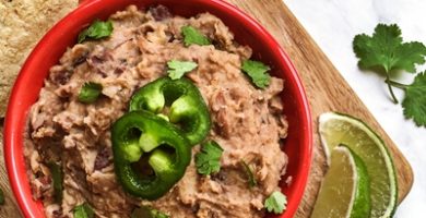 Frijoles Refritos (pueden ser negros, marrones, etc)
